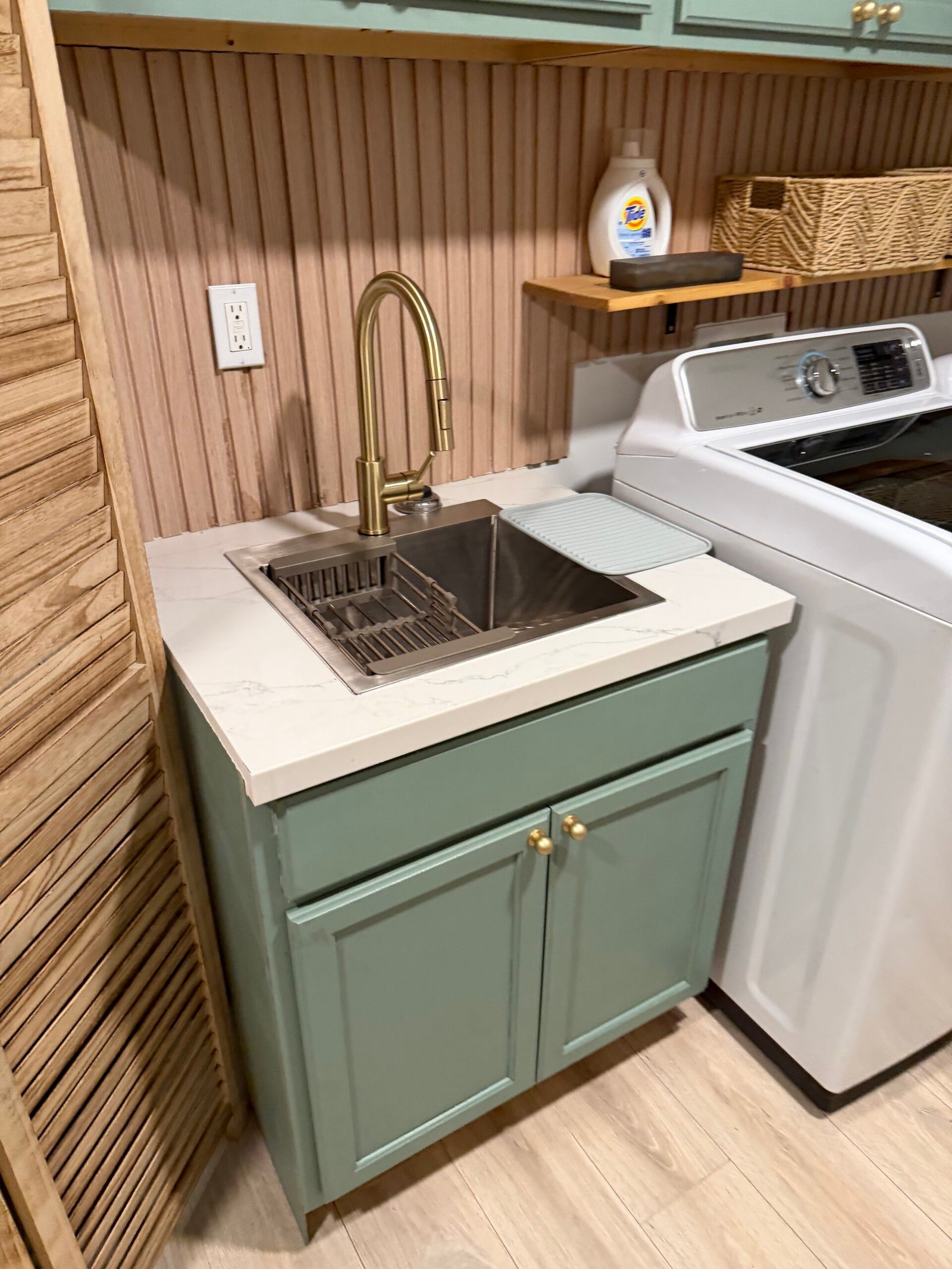 Clean apartment laundry and utility area
