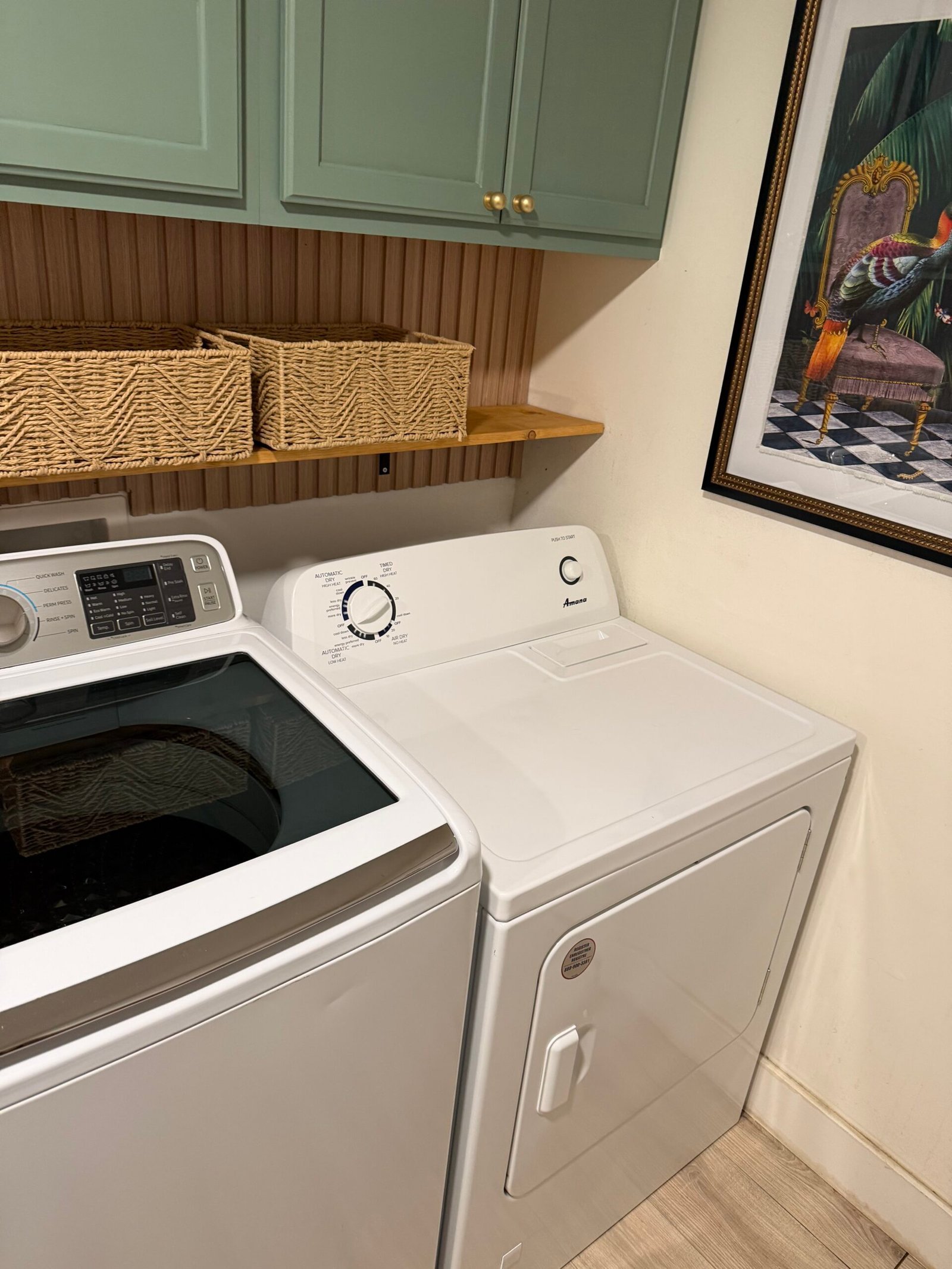 Clean laundry room washer and dryer for apartment residents