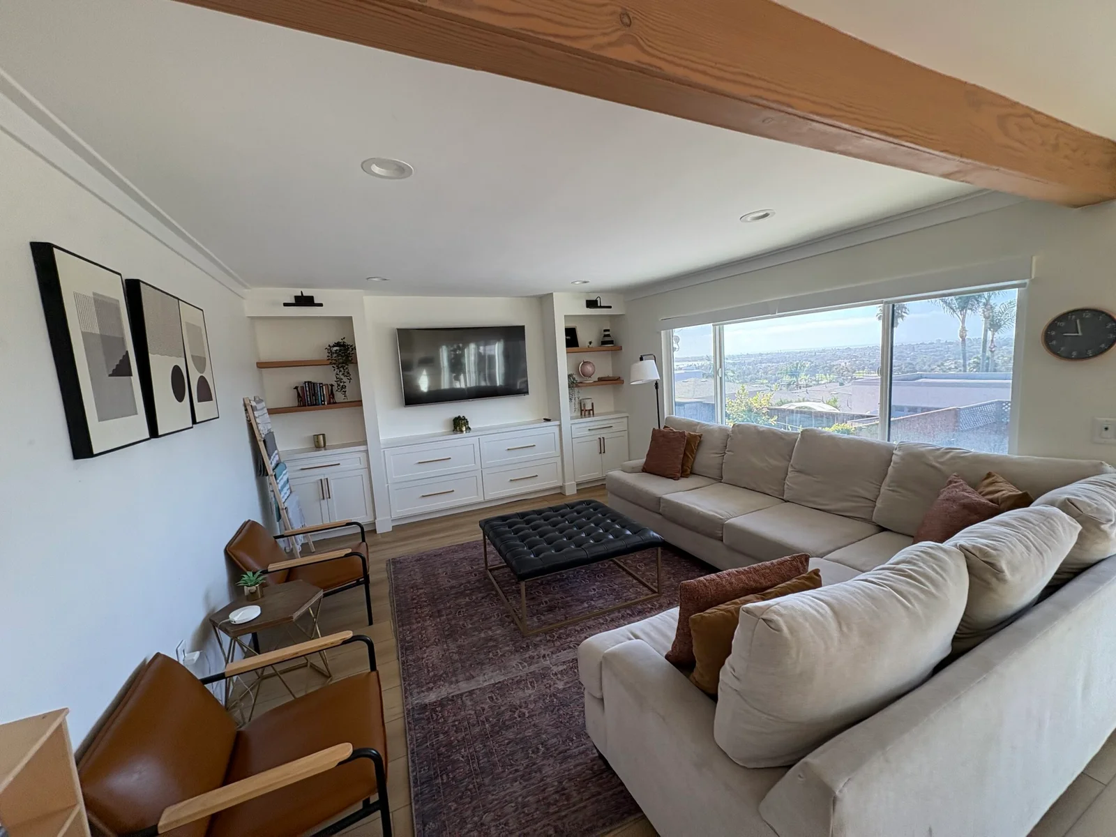 Bright, tidy living room after a recurring maintenance cleaning