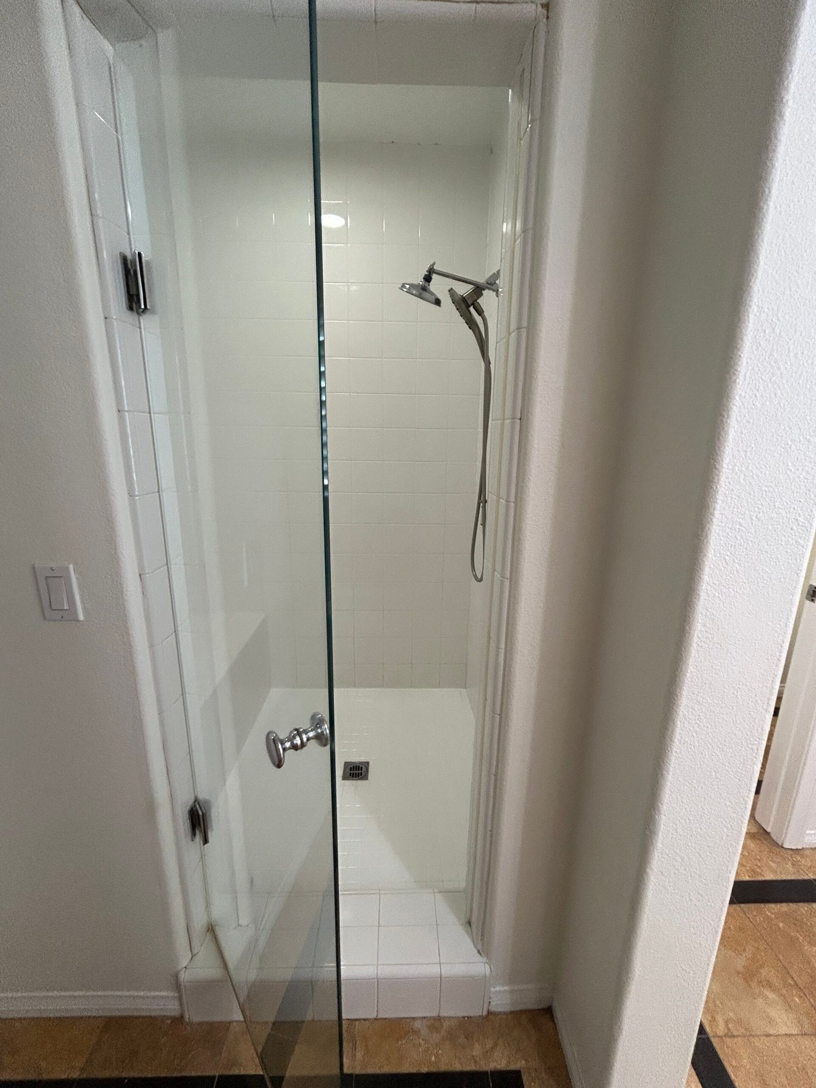 Clean bathroom mirror and shower area