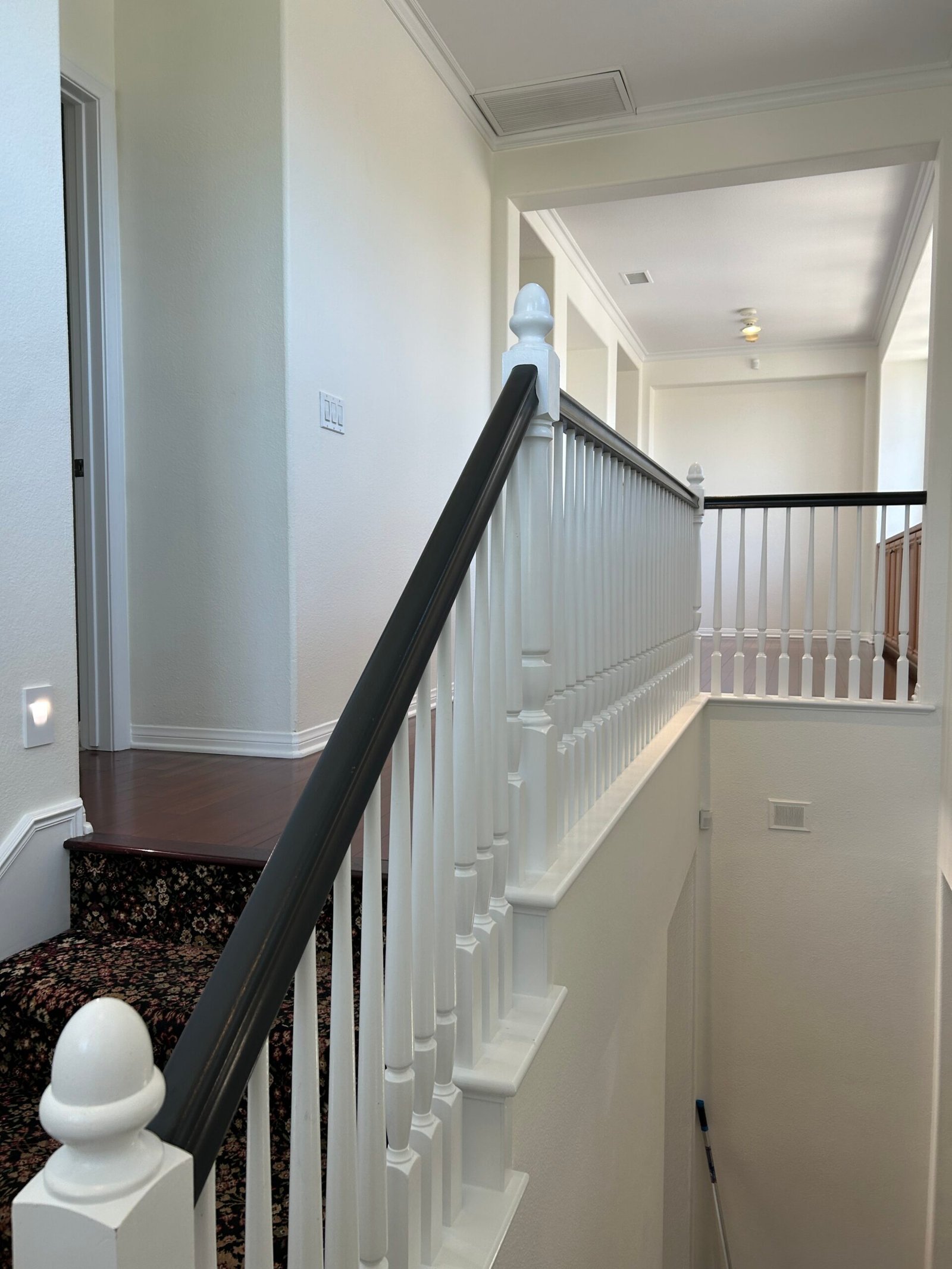 Clean staircase railing in a pet-friendly home