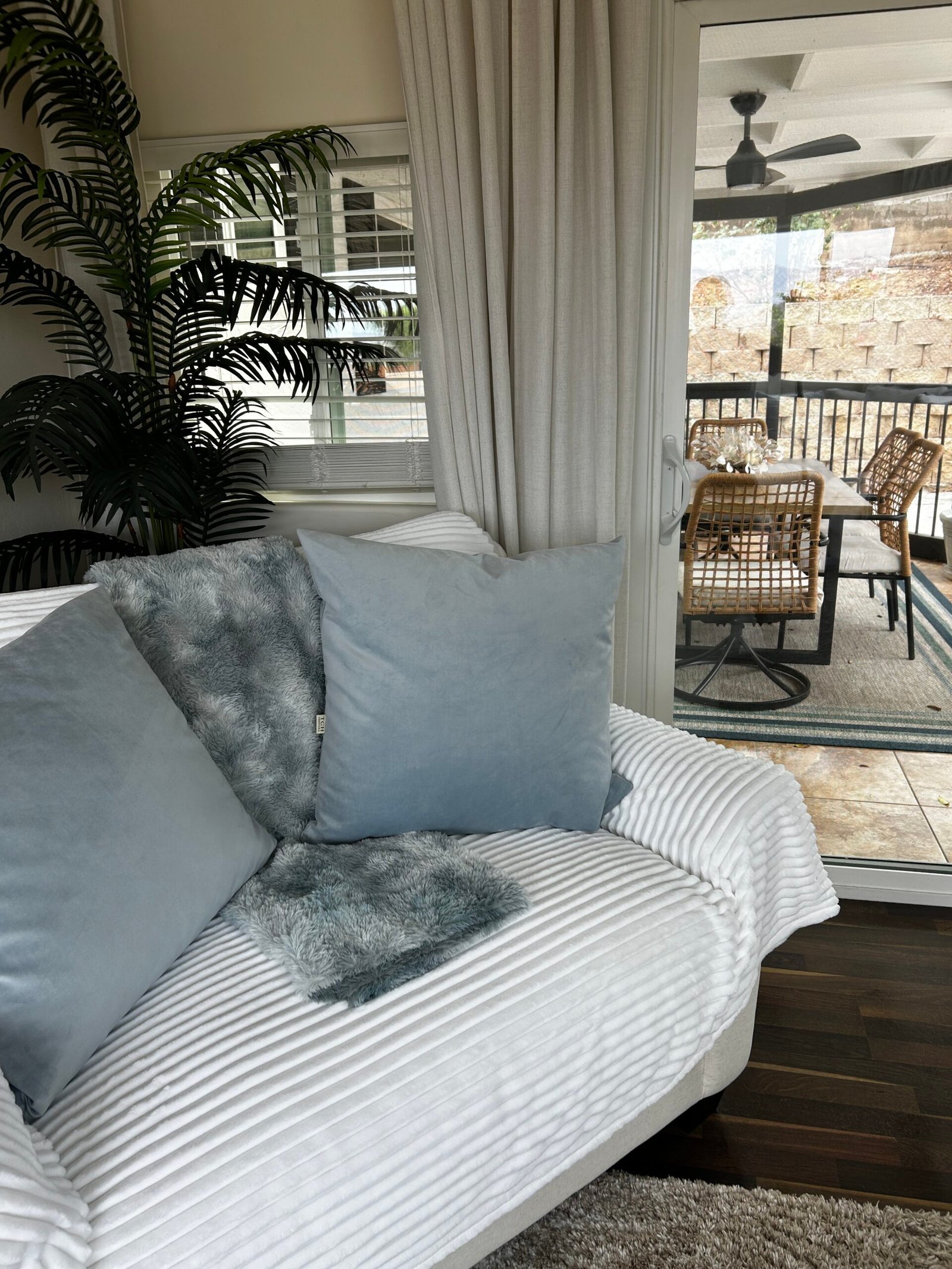 Cozy cushioned patio nook, ideal for busy families to relax