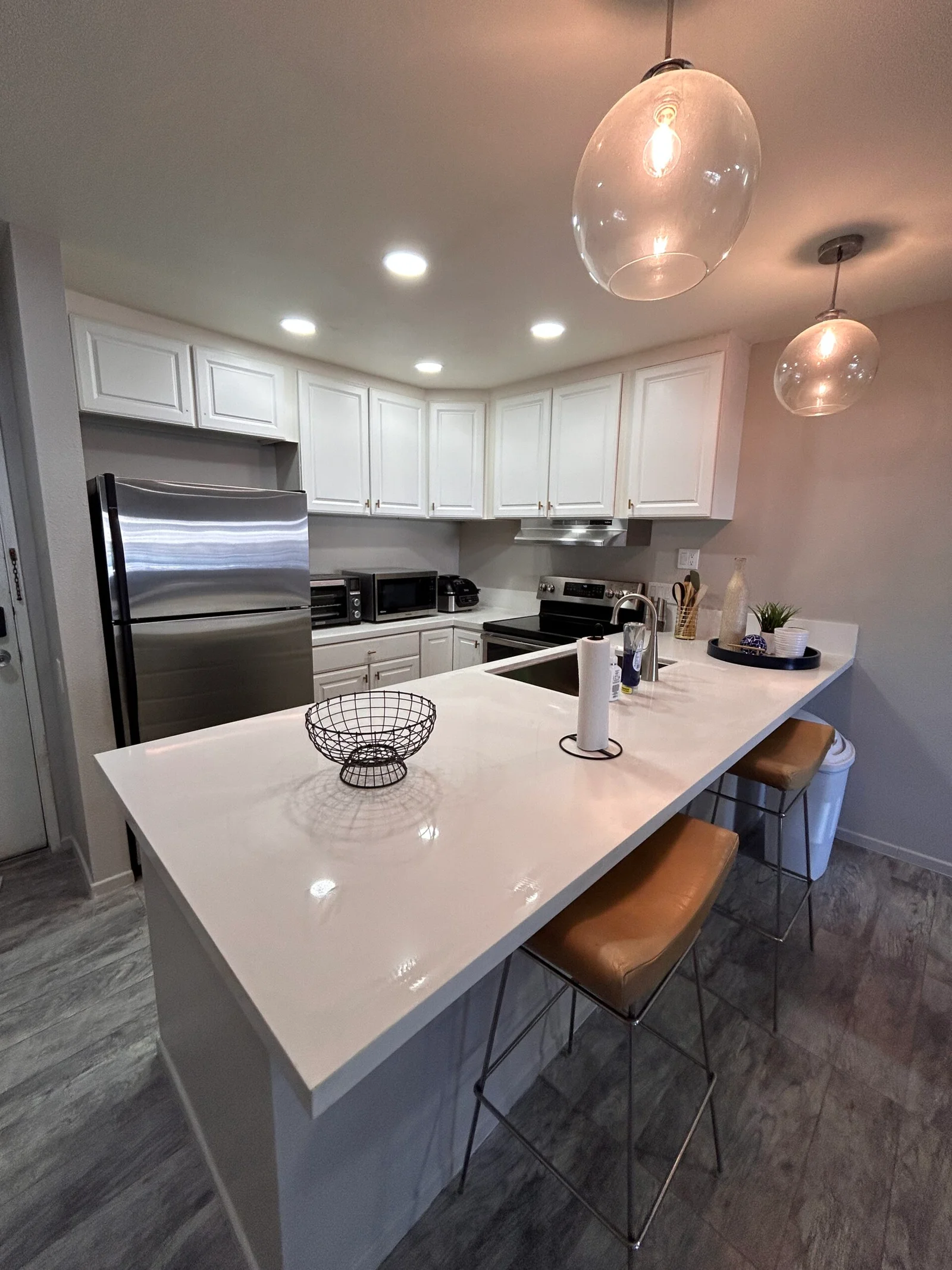 Clean kitchen with island after a Suddenly Clean visit