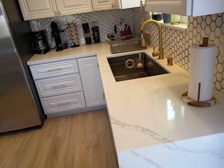 Clean kitchen counters, sink, and stovetop after a Suddenly Clean visit
