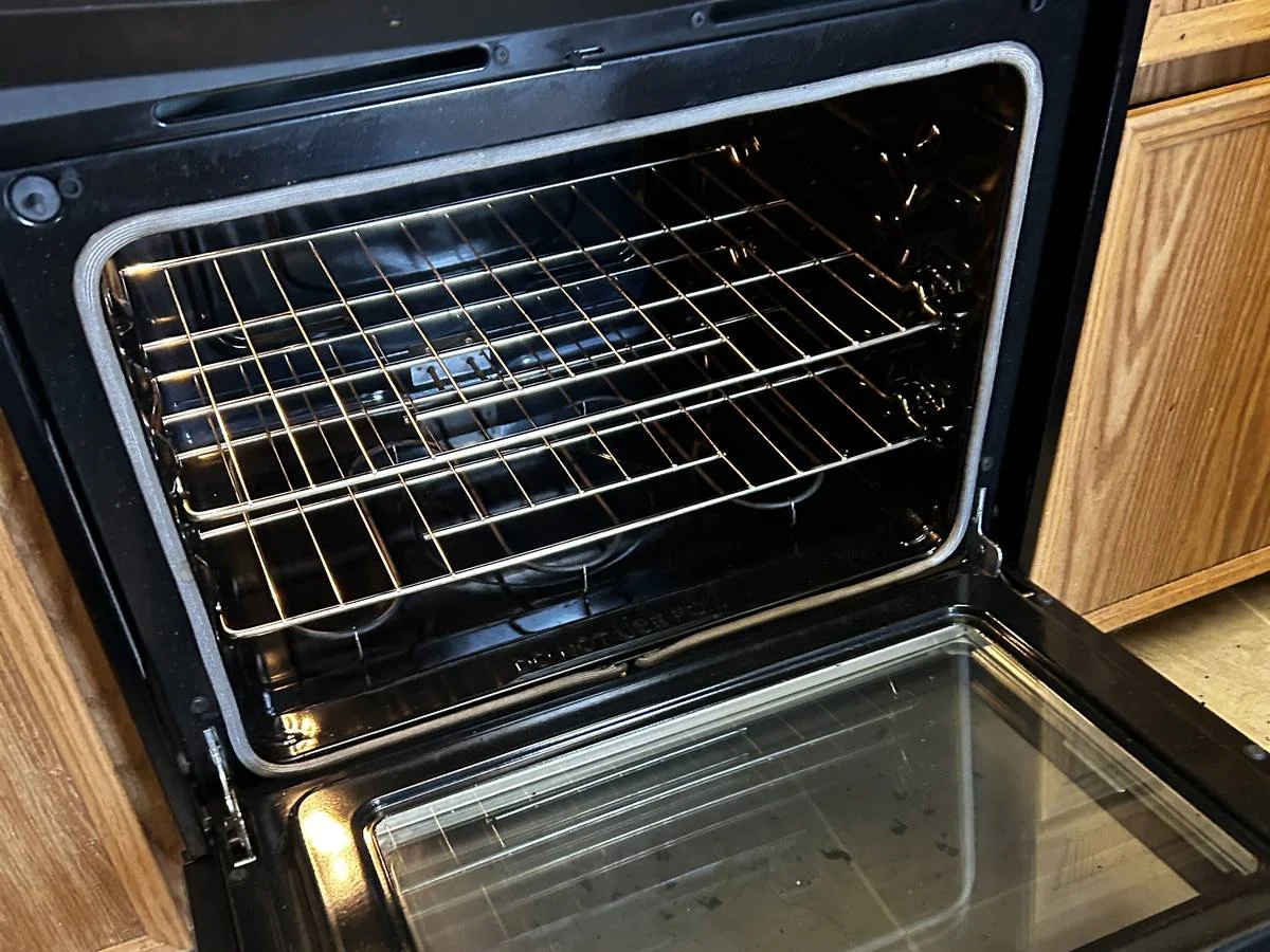 Clean oven interior with baked-on buildup removed after a deep cleaning