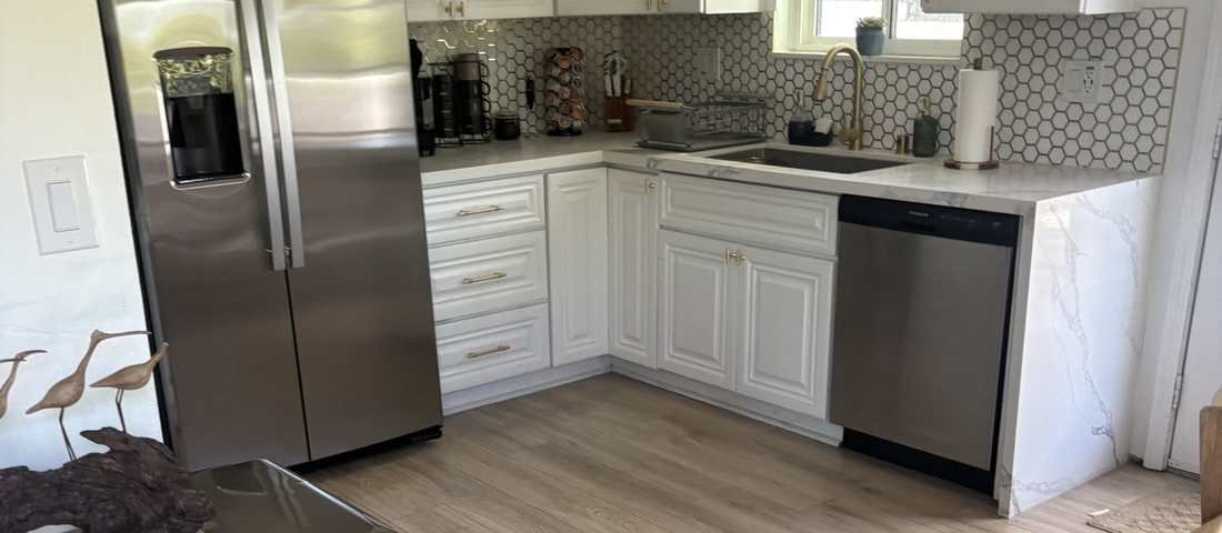 Freshly deep-cleaned kitchen with spotless counters and appliances