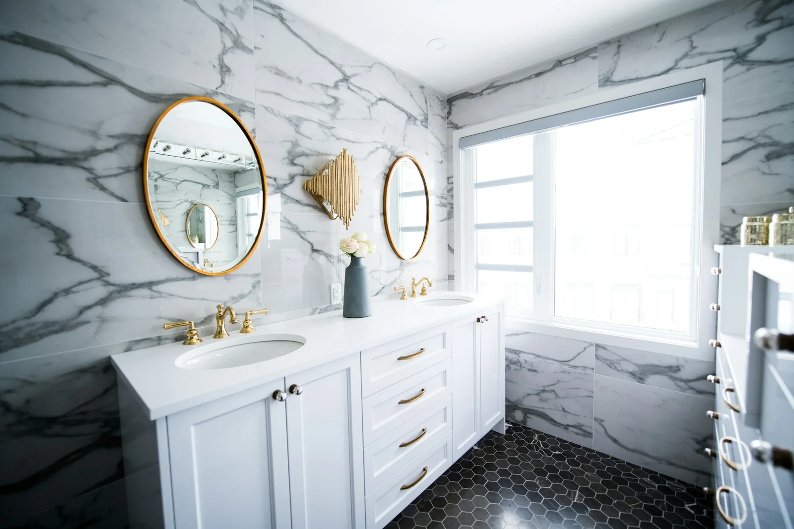Clean bathroom vanity and mirror kept fresh during a Suddenly Clean recurring visit
